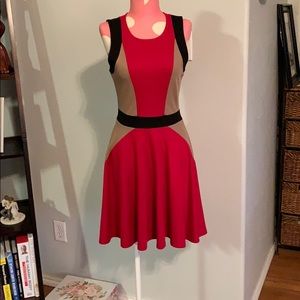 Red, beige, and black dress